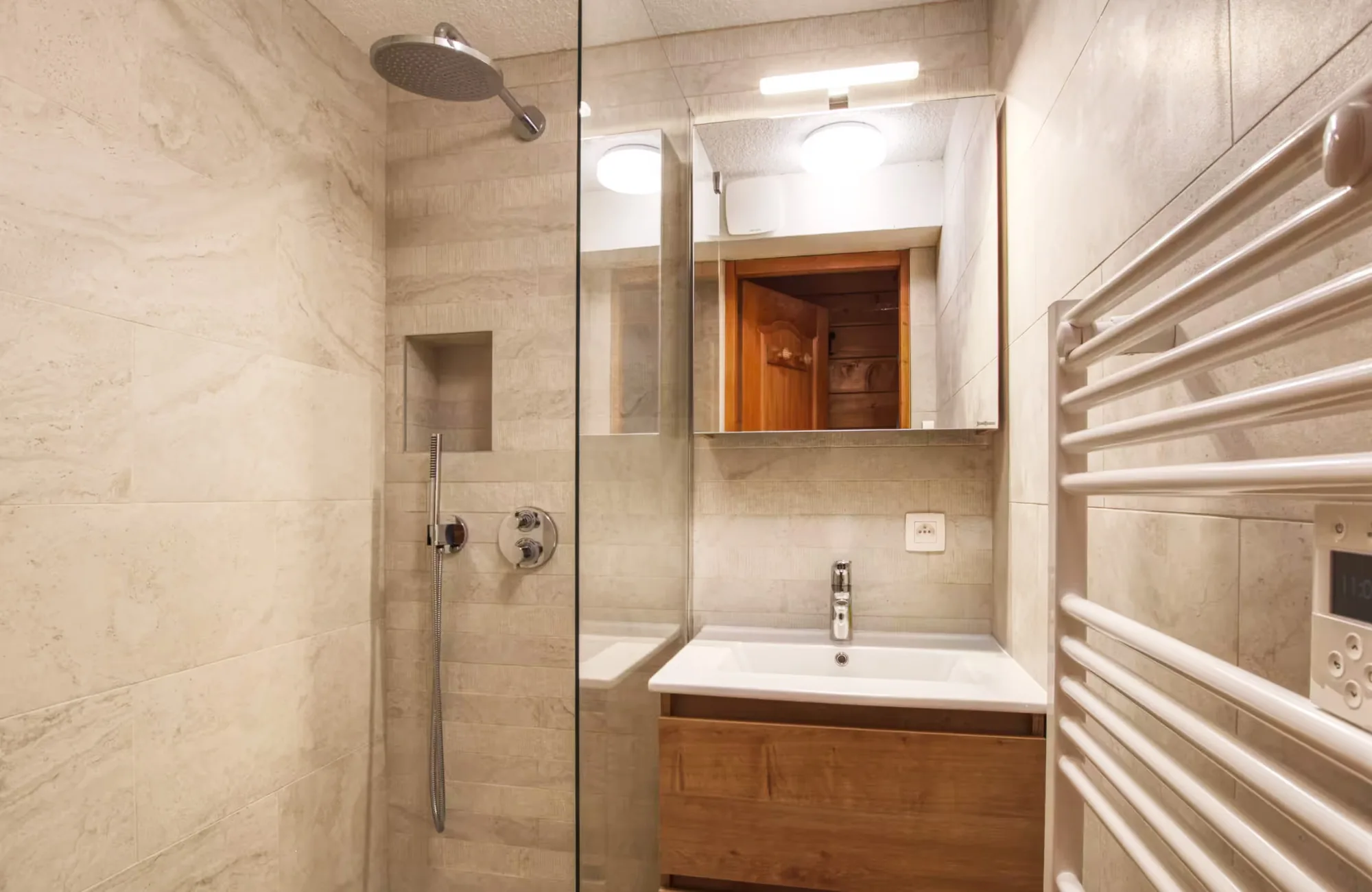 Modern shower room with heated towel rail